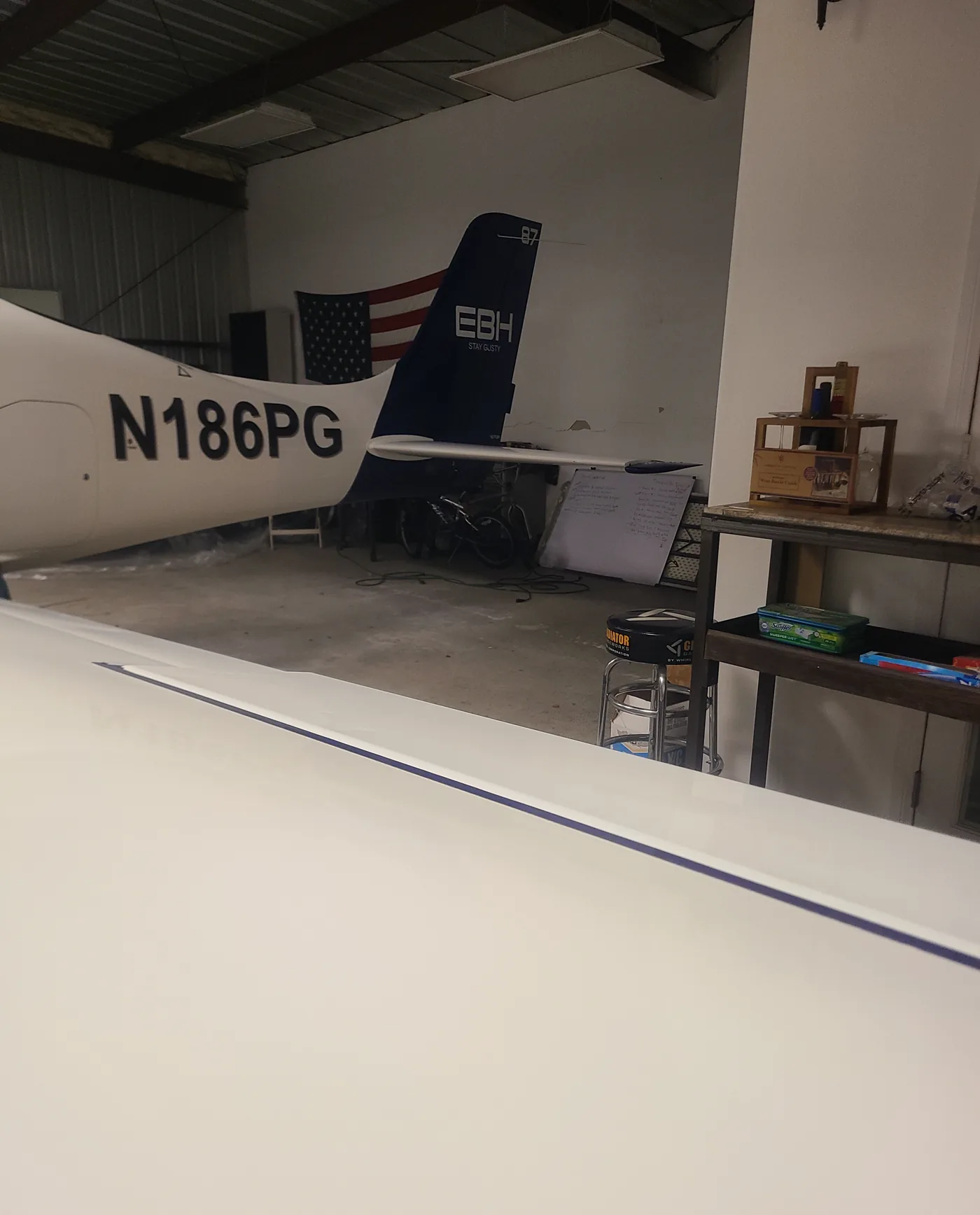 Aircraft detailing service in a California hangar