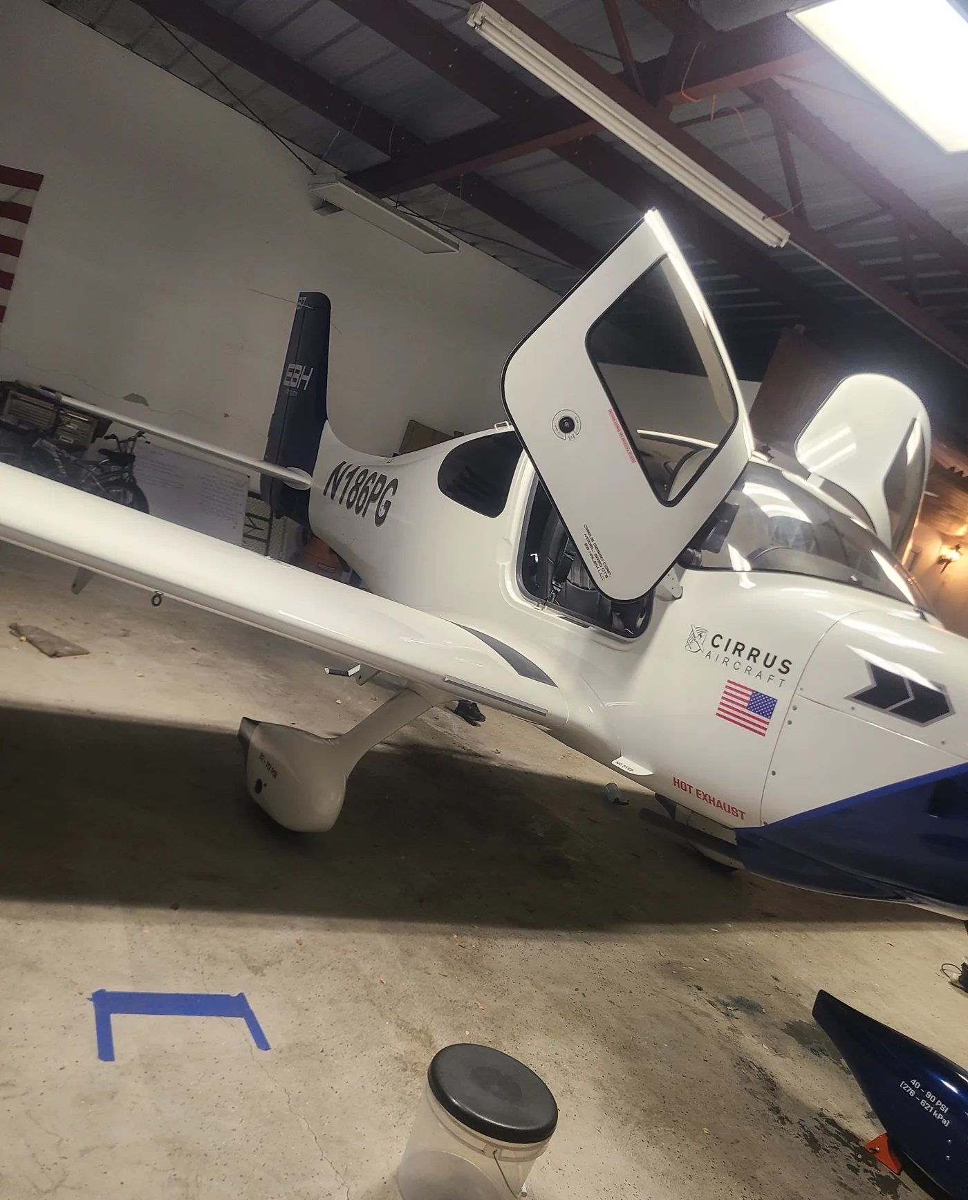 Cirrus SR22 in a hangar after a full exterior detail