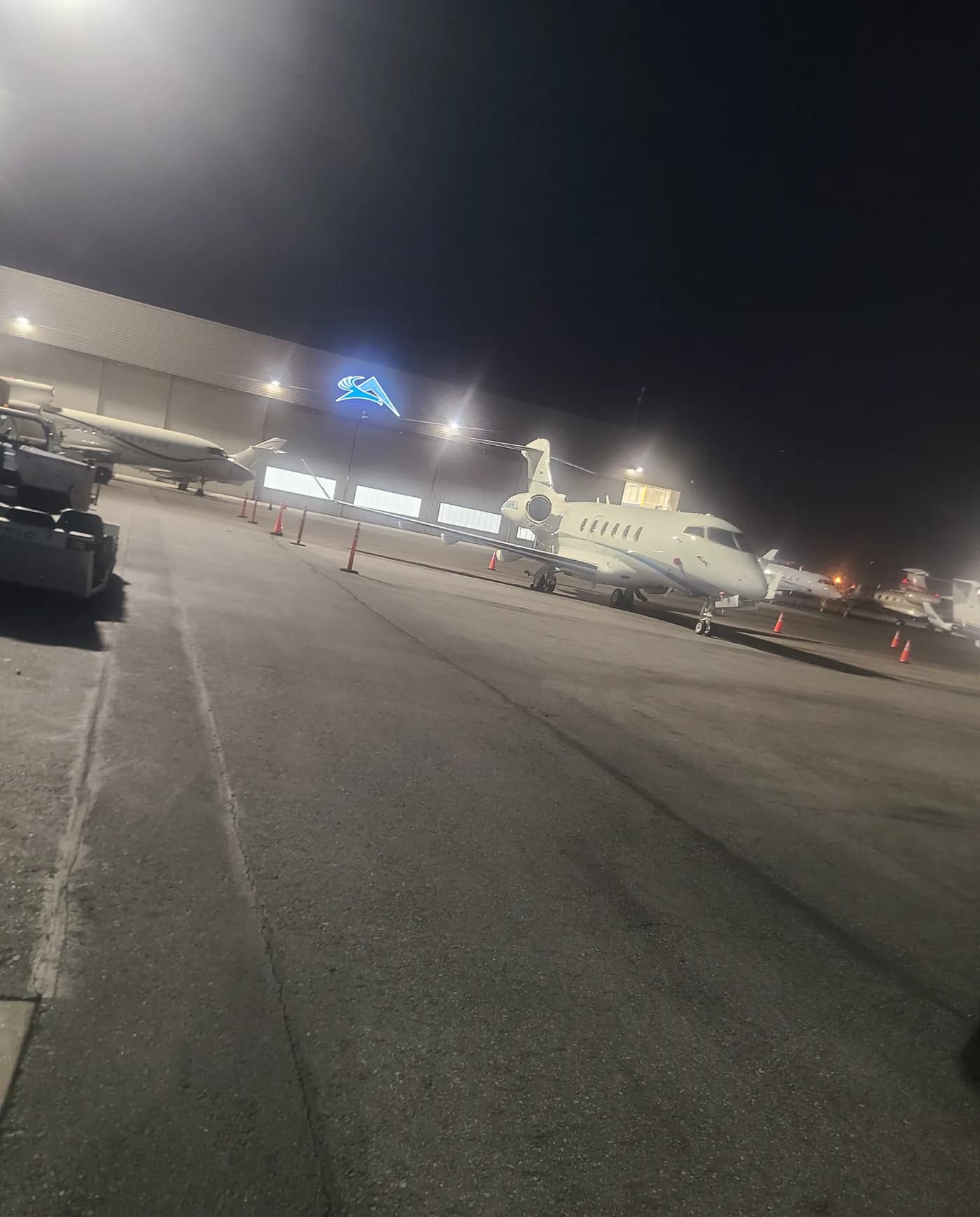 Private jet in a hangar at night before detailing